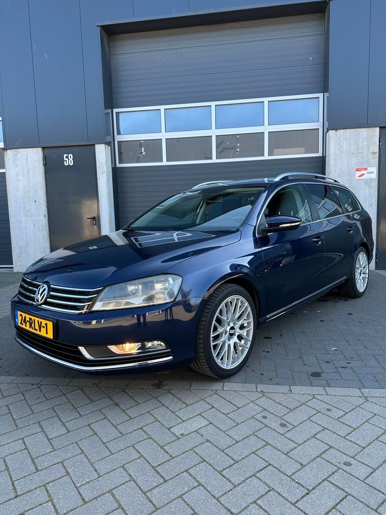 Volkswagen Passat 1.6 TDI 77KW Bluemotion Variant 2011 Blauw, Voorwielaandrijving, Euro 5, Stof, Zwart