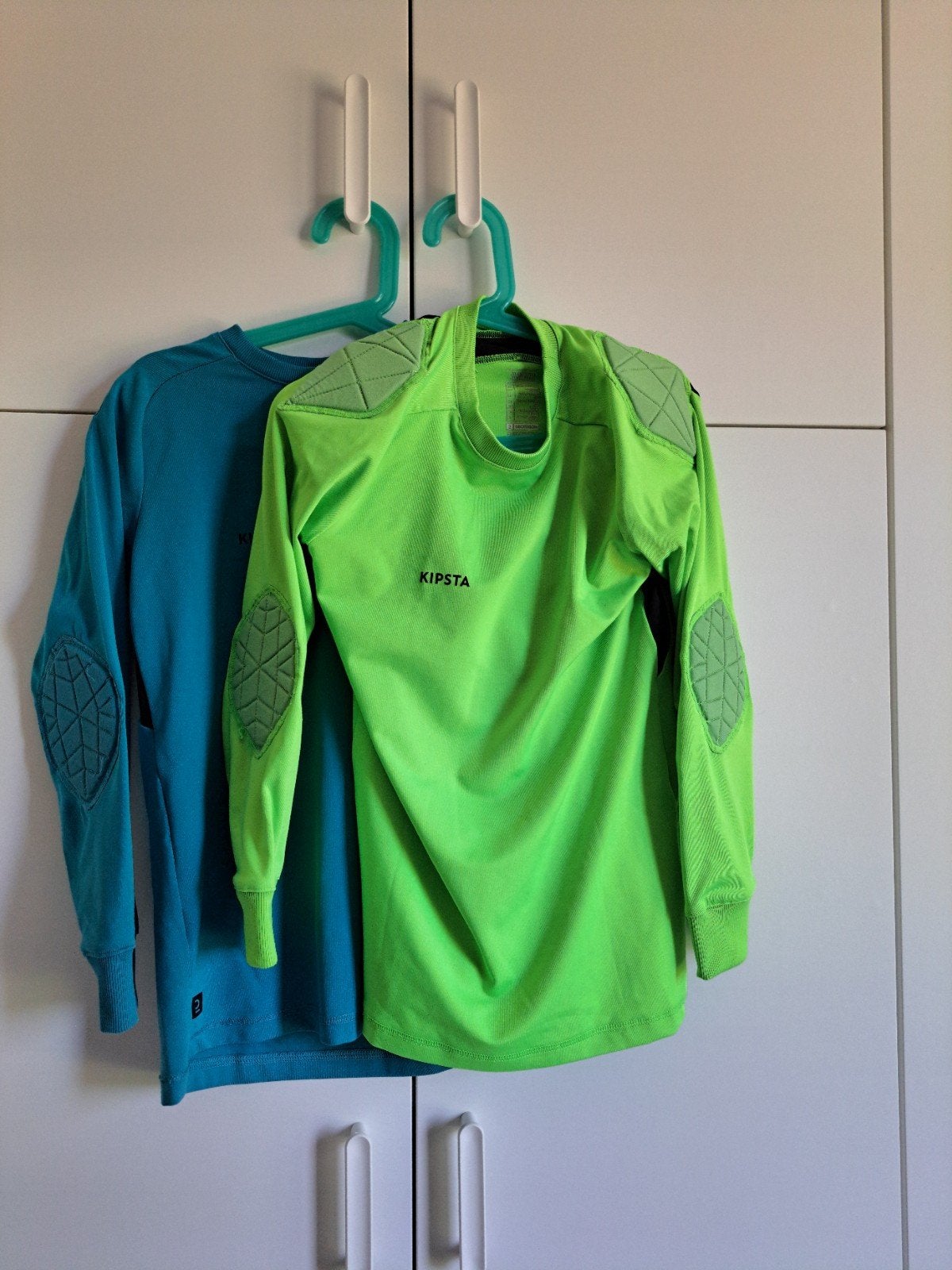 2x keepersshirt Kipsta Decathlon 131-140 cm 8/9 jaar, Gebruikt, Jongen of Meisje, Kipsta, Sport- of Zwemkleding