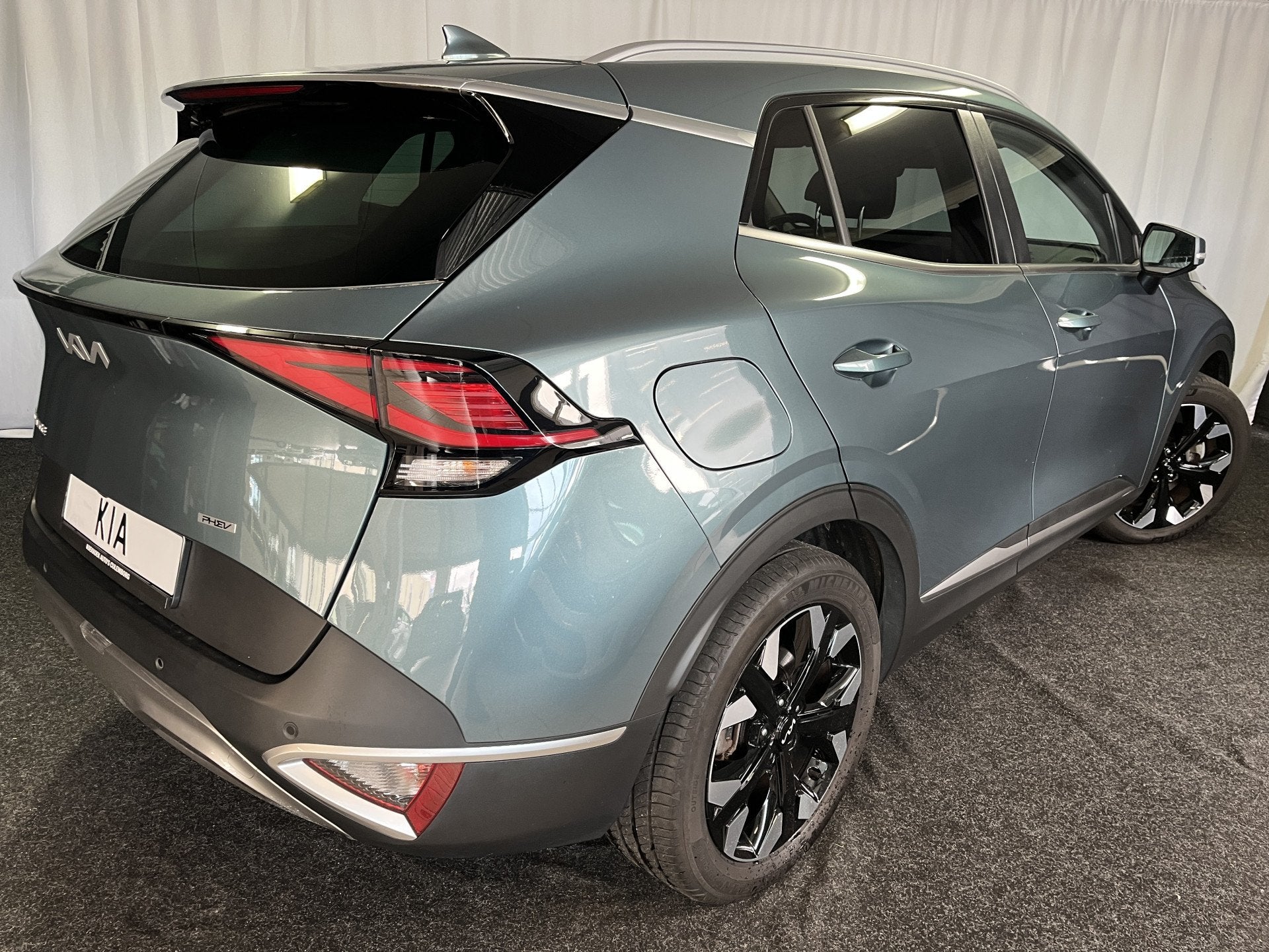Kia Sportage 1.6 T-GDi PLUG-IN Hybrid AWD DynamicPlusLine 1E, Auto's, Kia, Gebruikt, 4 cilinders, Met garantie (alle), Leder en Stof