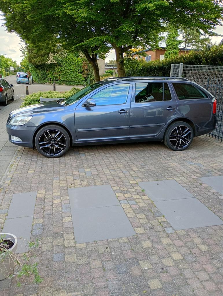 Skoda Octavia 1.2 TSI Combi DSG 2011 Grijs, 4 cilinders, Origineel Nederlands, 1200 kg, 1205 kg