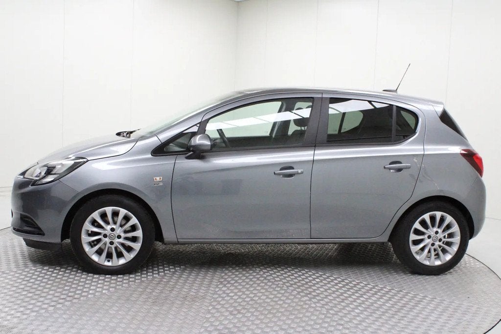 Opel Corsa 1.0 Turbo 120 Jaar Edition | climate € 9.900,00, Stof, Gebruikt, Automatische klimaatregeling, 49 €/maand