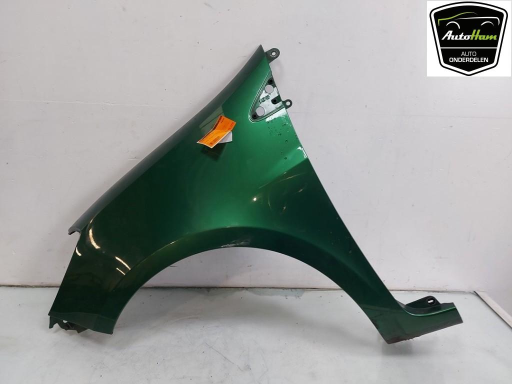 Spatbord Links Voor Renault Clio III (BR/CR) 2006 631014270R, Gebruikt, Renault Deutschland AG, Dialog.deutschland@renault.de