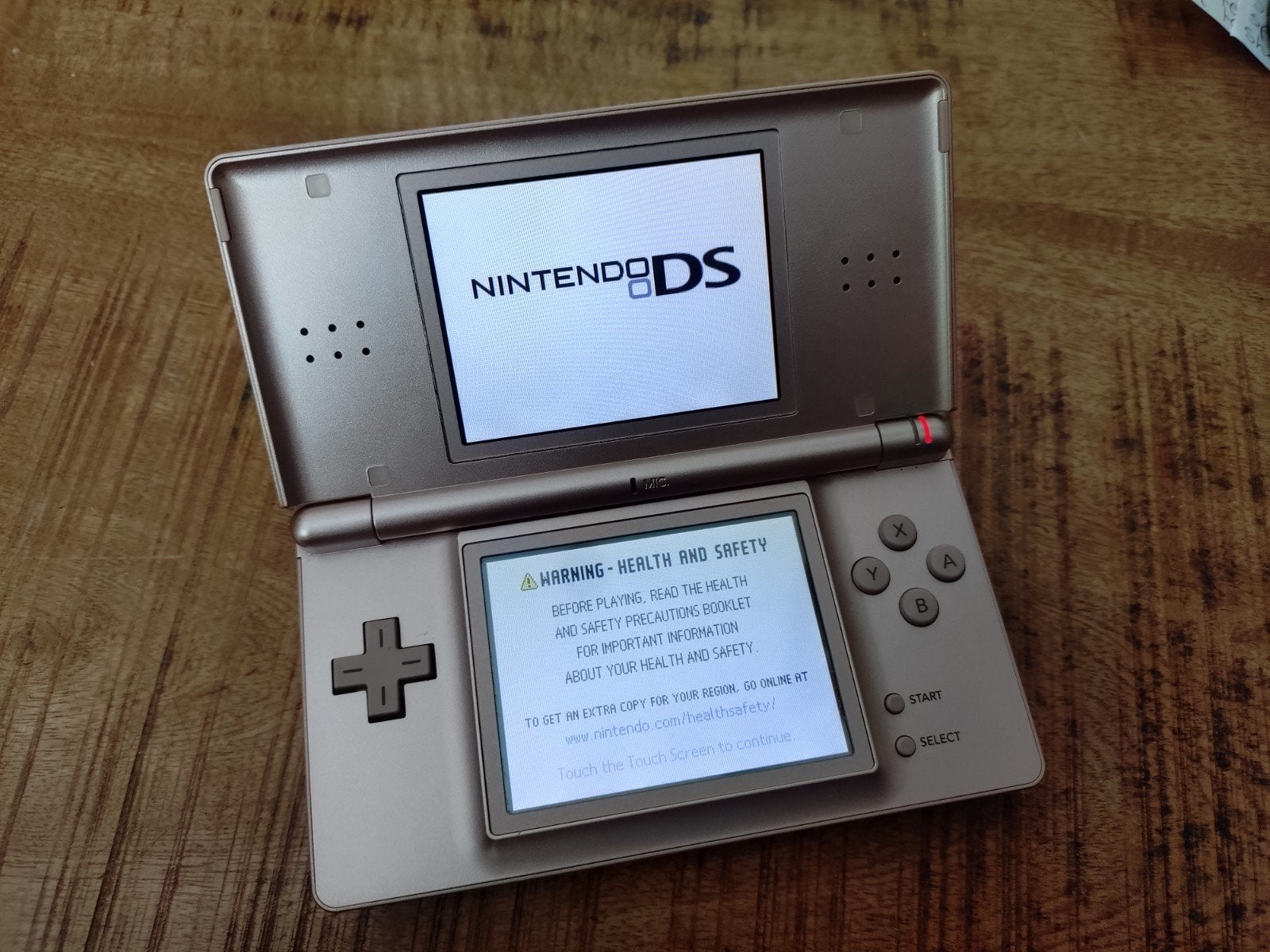 Nintendo DS lite, Spelcomputers en Games, Spelcomputers | Nintendo DS, Ophalen of Verzenden, Gebruikt, Roze, DS Lite