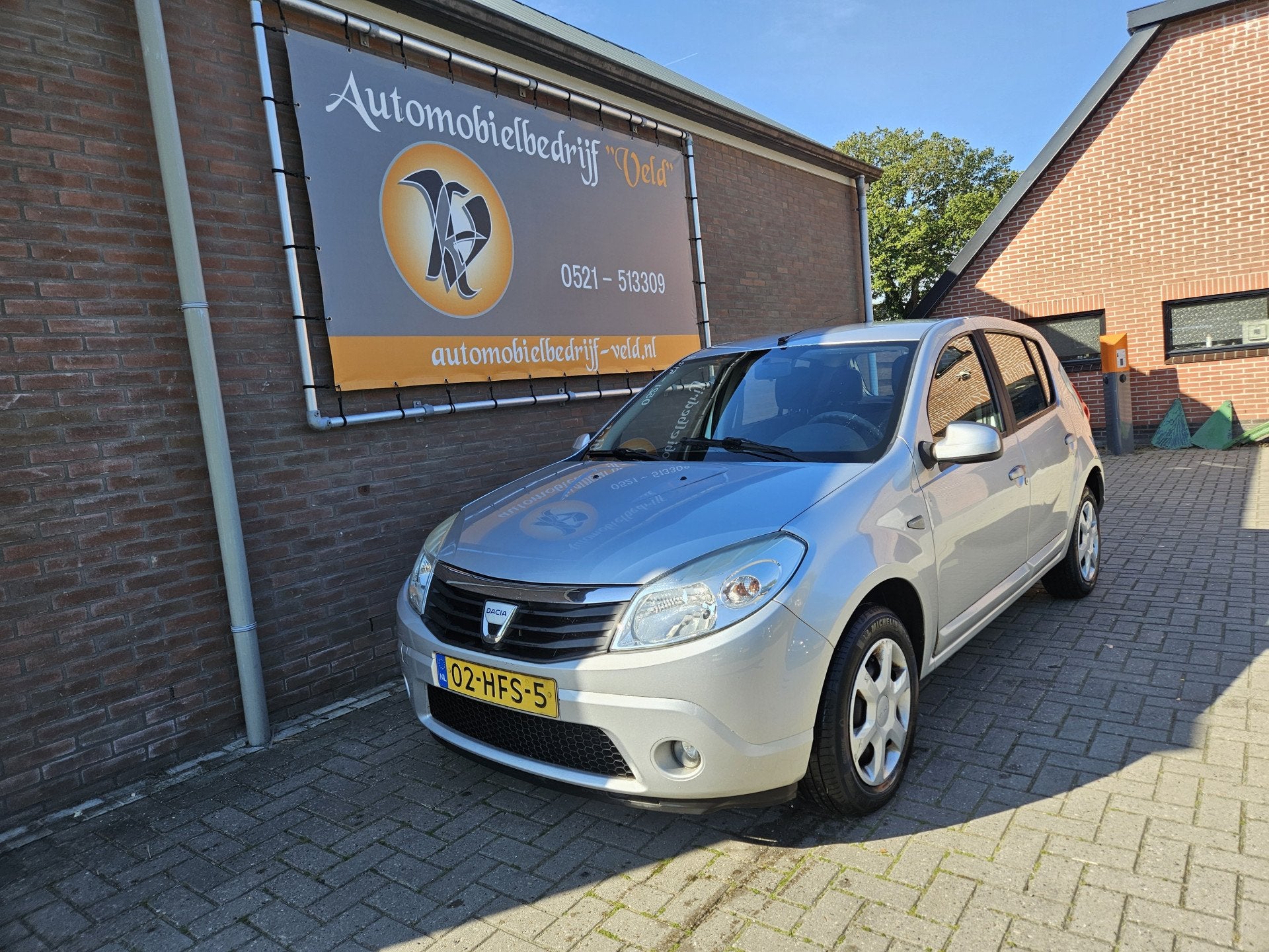 Dacia Sandero 1.4 Lauréate (bj 2008), Auto's, Voorwielaandrijving, Stof, 4 cilinders, Bedrijf