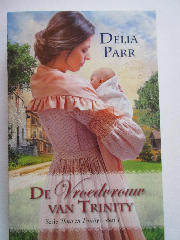 Delia Parr - De vroedvrouw van Trinity, Boeken, Romans, Zo goed als nieuw, Nederland, Ophalen of Verzenden