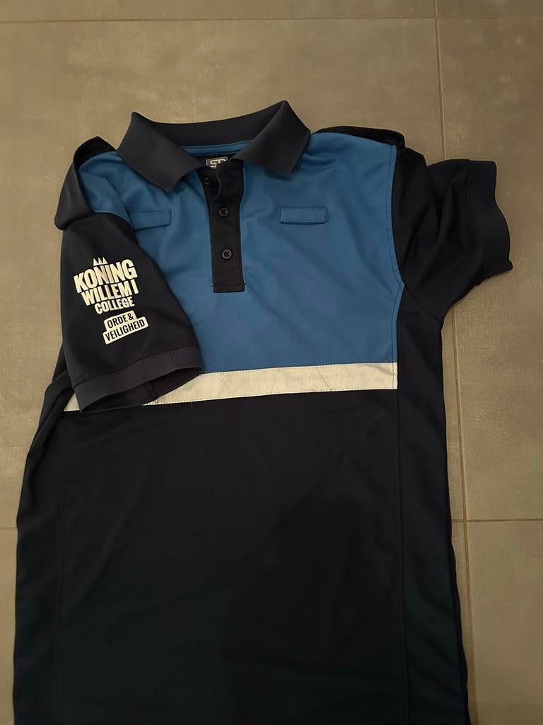 Koning willem 1 college orde en veiligheid, Kleding | Heren, Polo's, Zo goed als nieuw, Maat 46 (S) of kleiner, Blauw, Ophalen