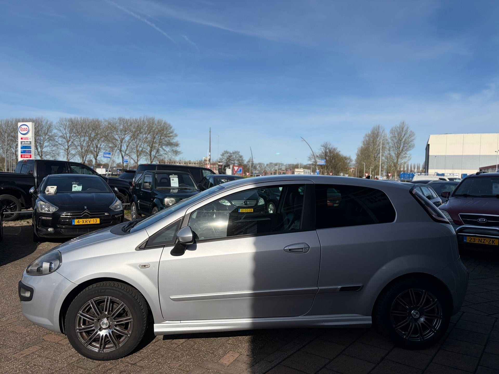 Fiat Punto Evo 1.3 M-Jet Racing - Leder - Clima - Cruise - Z, Auto's, Fiat, Voorwielaandrijving, Euro 5, Gebruikt, Zwart