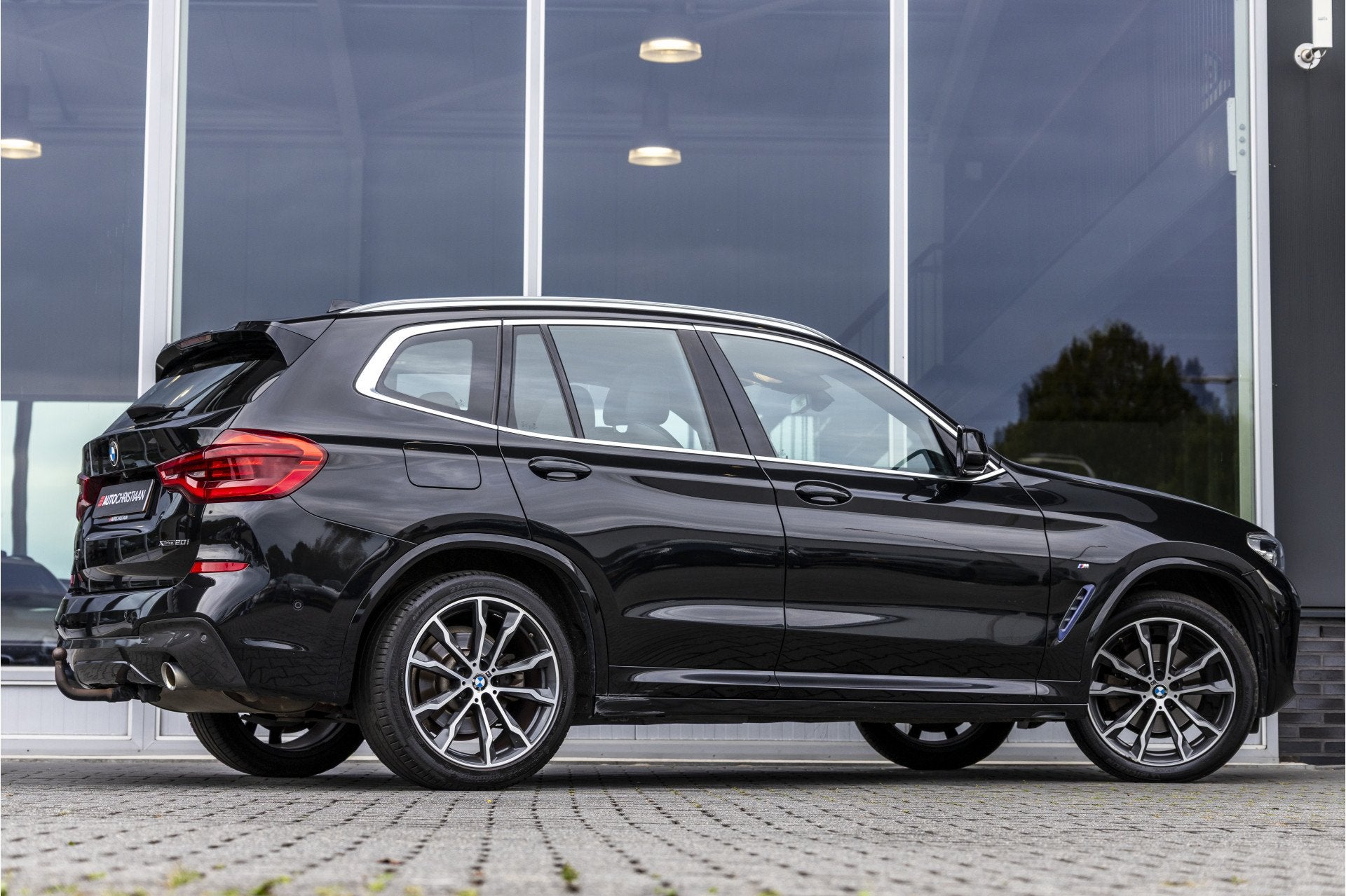 BMW X3 xDrive20i High Executive | Pano | Trekhaak | Head-up, Auto's, Gebruikt, 4 cilinders, Zwart, Bedrijf