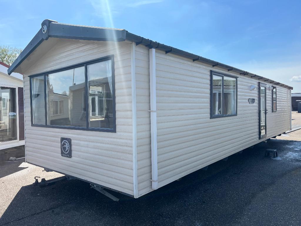 Swift | 12.00x3.75 | 3SLP | CV | Wintervast | inc.transport, Caravans en Kamperen, Stacaravans, meer dan 6, Ophalen of Verzenden