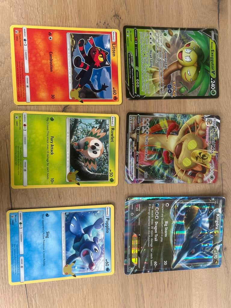 Grote collectie Pokémon kaarten in map + extra boekje, Ophalen of Verzenden, Gebruikt, Meerdere kaarten, Foil