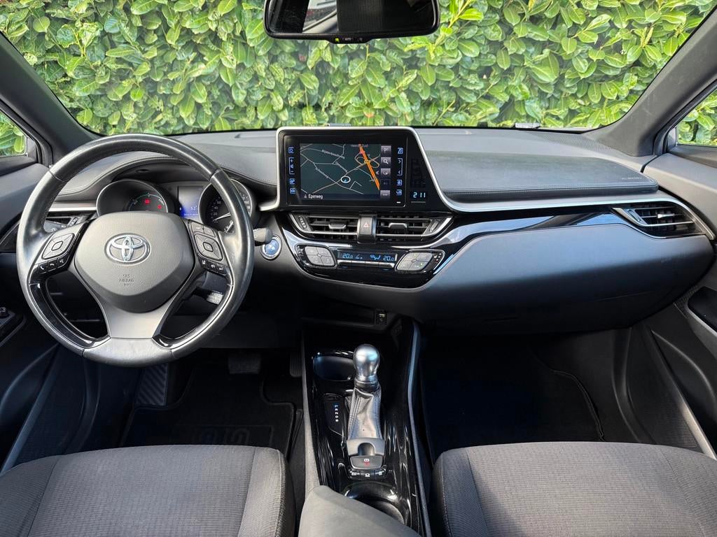 Toyota C-HR 1.8 Hybrid Dynamic AUT|NAVI|TREKH|CAMERA|ACC|NAP, Auto's, Toyota, 4 cilinders, 26 km/l, Hybride Elektrisch/Benzine