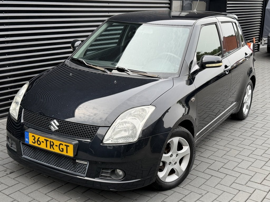 Suzuki Swift 1.3 Shogun| 5DRS| ZWART| AIRCO| CRUISE| PDC| NA, Stof, 965 kg, 400 kg, Origineel Nederlands