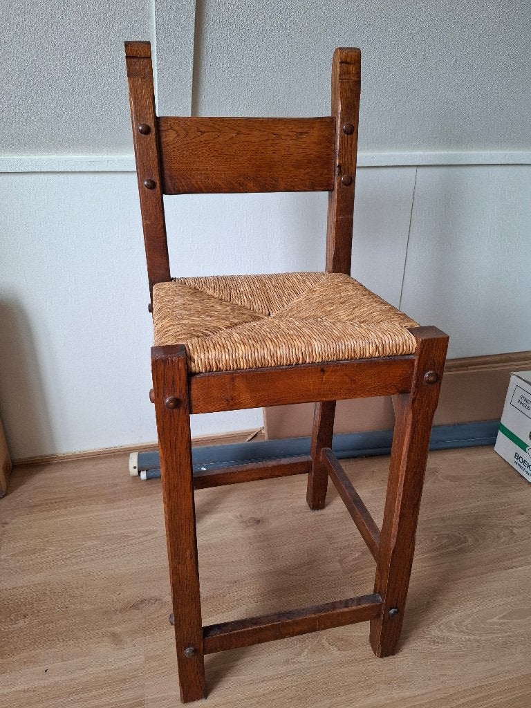 Houten hoge stoel met rieten zitting, Ophalen