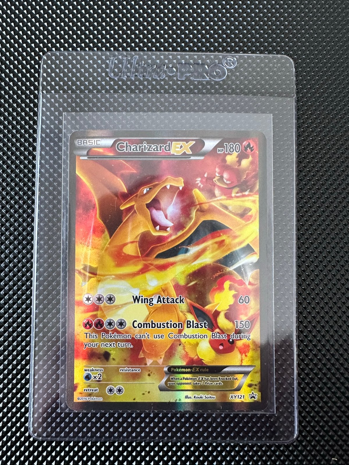 Charizard EX XY121 Pokémon Kaart, Ophalen of Verzenden, Zo goed als nieuw, Losse kaart