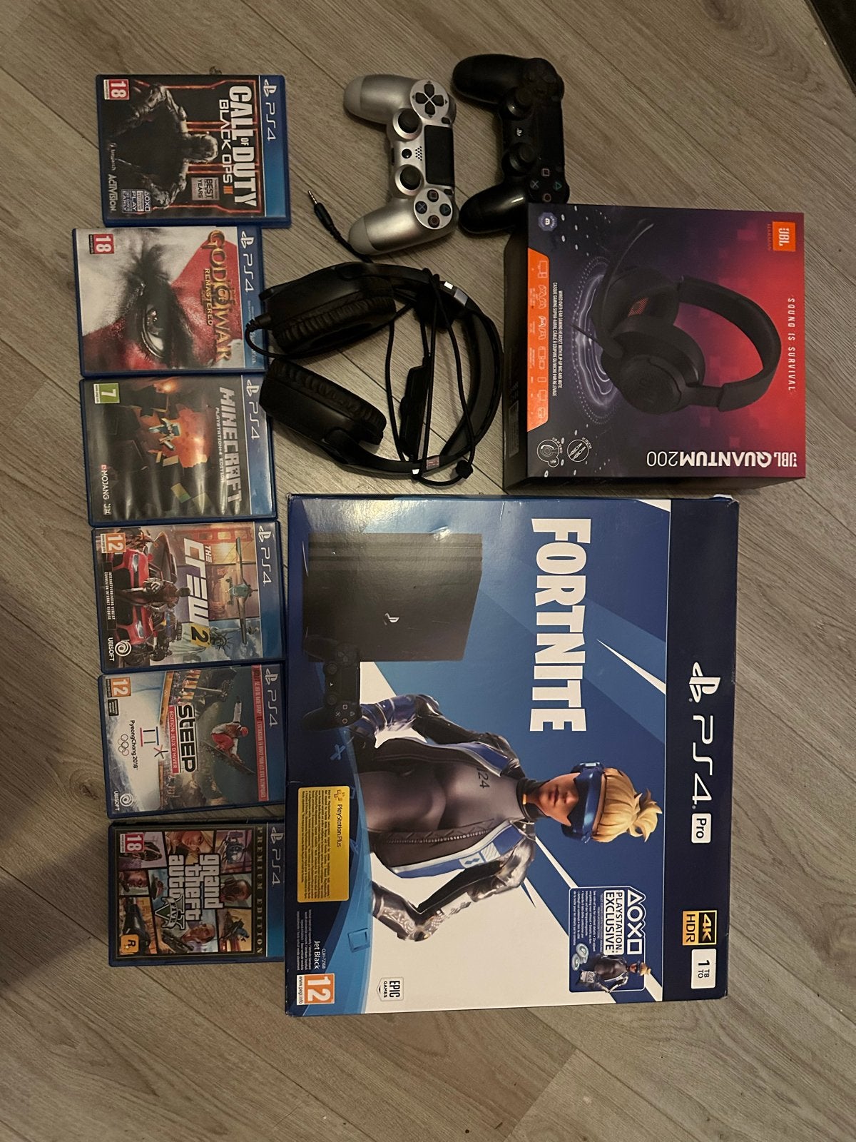 PlayStation 4 Pro met 6 games, 2 controllers en 2 headsets, Met 2 controllers, Ophalen of Verzenden, 1 TB, Pro