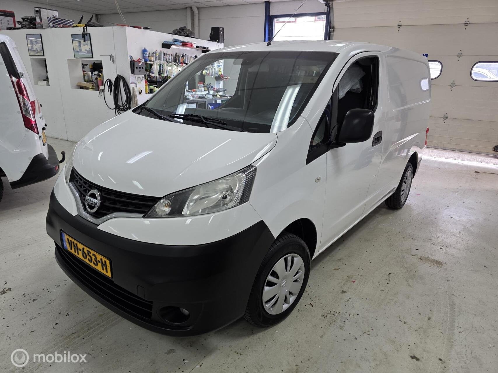 Nissan NV200 1.5 dCi Airco Cruise Camera Navi, Auto's, Euro 5, Gebruikt, 4 cilinders, Wit