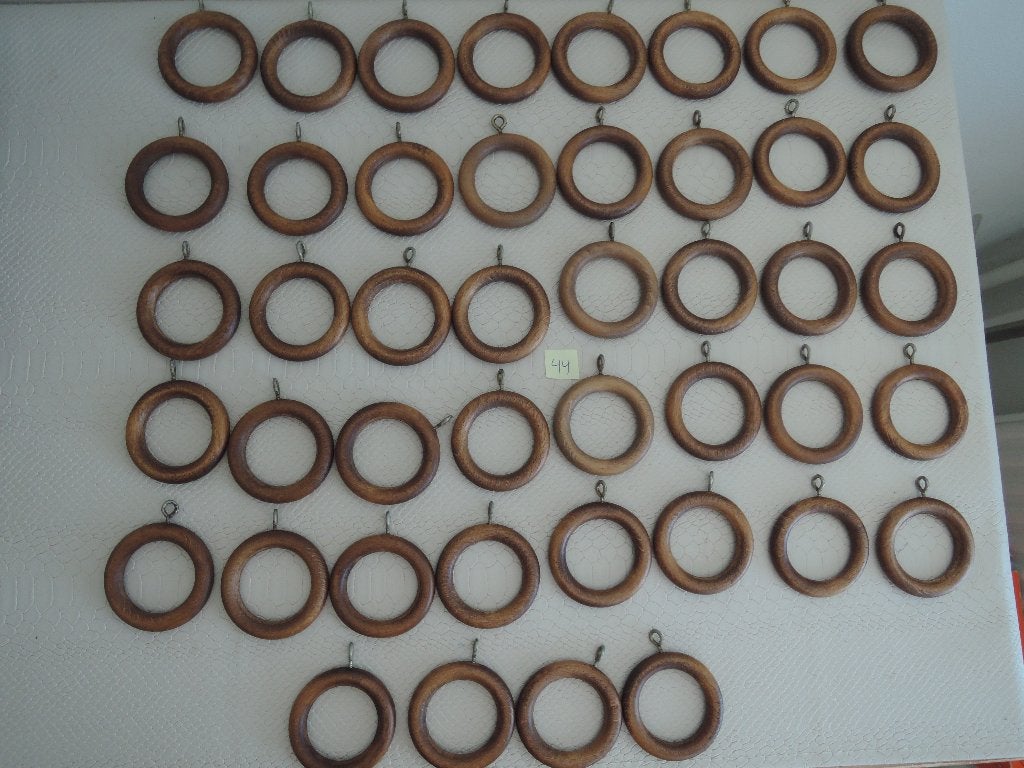 44 Ouderwetse houten gordijnringen met oogje (44), Ophalen of Verzenden, Zo goed als nieuw