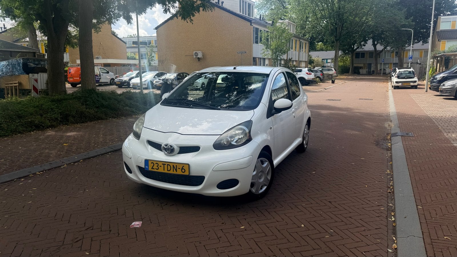 Toyota Aygo 1.0 12V Vvt-i 5DRS 2012 Wit, Auto's, Voorwielaandrijving, Zwart, 4 stoelen, Origineel Nederlands