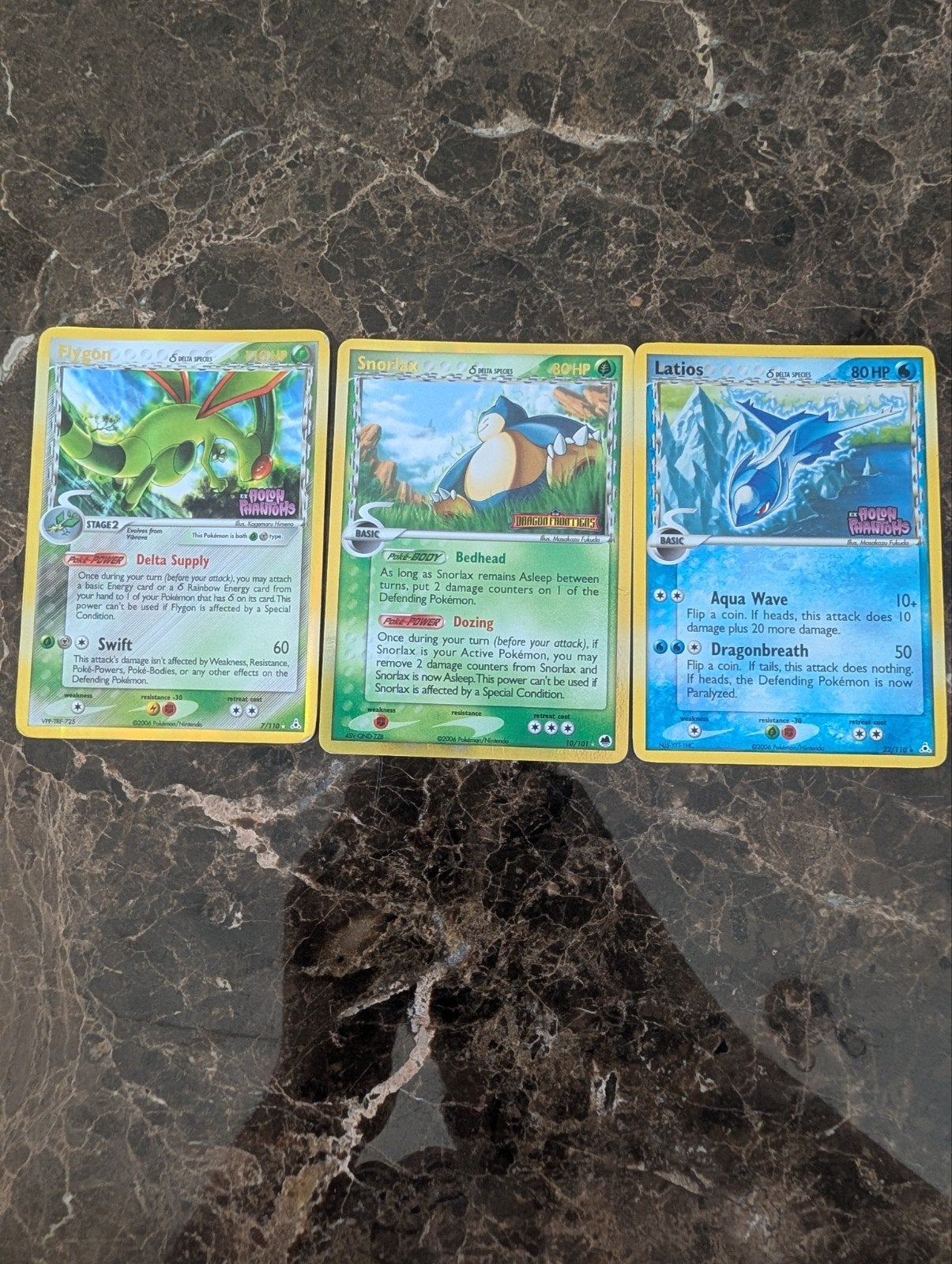 stamped Delta Species Kaarten - Snorlax, Flygon ex, Latios, Ophalen of Verzenden, Gebruikt