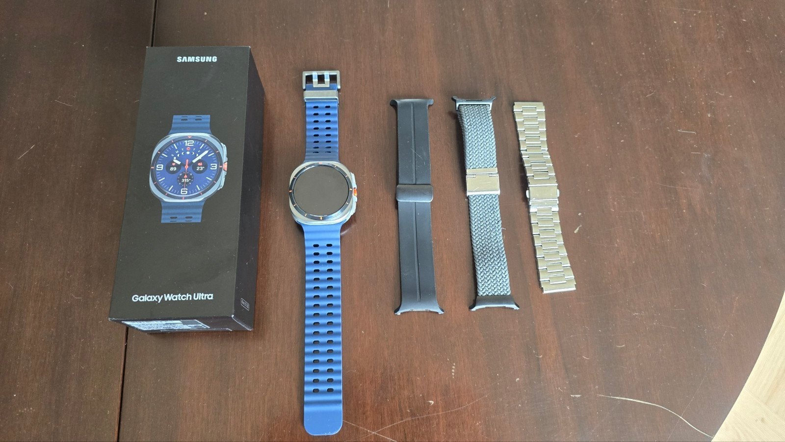 Samsung Galaxy Watch Ultra 2025 met 4 banden, Sieraden, Tassen en Uiterlijk, Smartwatches, Blauw, Ophalen of Verzenden, Zo goed als nieuw