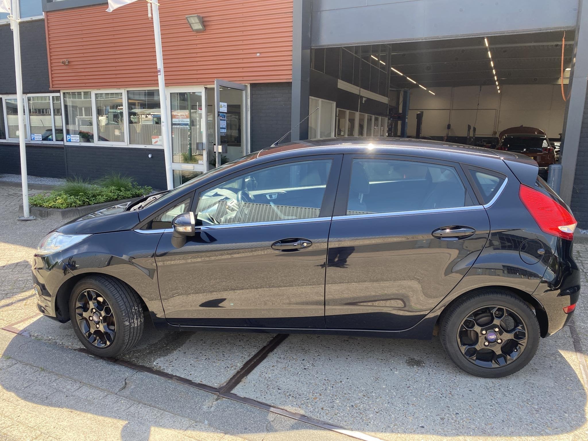 Ford Fiesta 1.25 Titanium X - Pack | 5 Deurs | Bluetooth | C, Auto's, Voorwielaandrijving, Stof, Met garantie (alle), 82 pk