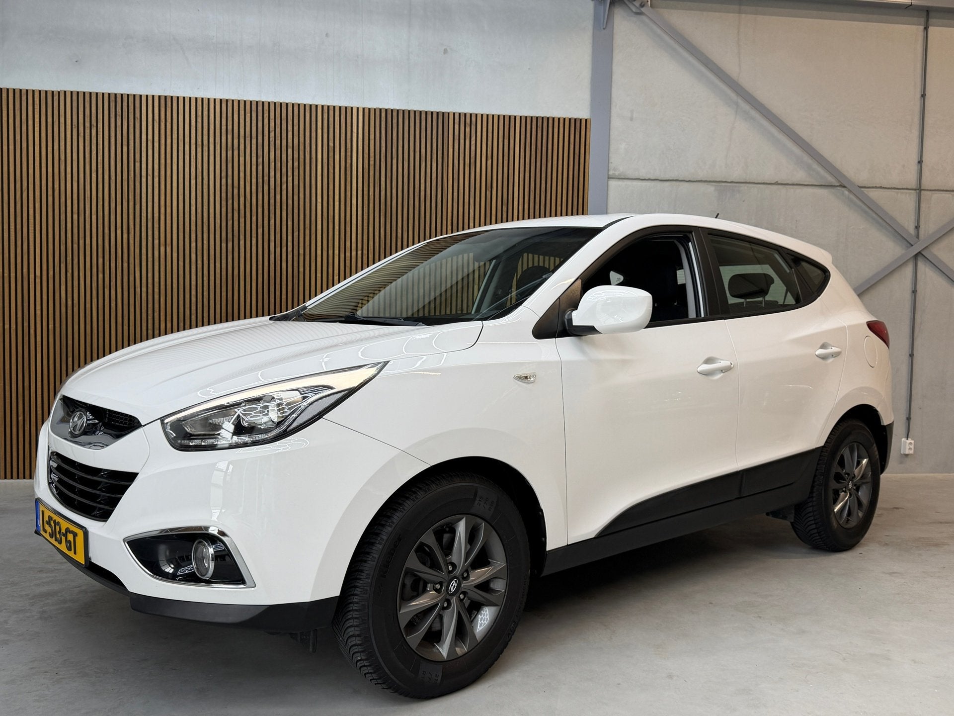 Hyundai Ix35 2.0i i-Motion AUTOMAAT, Auto's, Hyundai, Euro 5, Stof, Gebruikt, Zwart