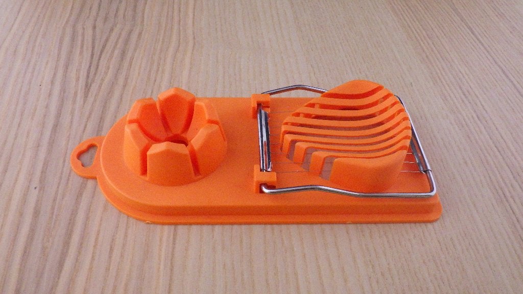 mooie oranje eiersnijder, Ophalen of Verzenden, Huis en Inrichting