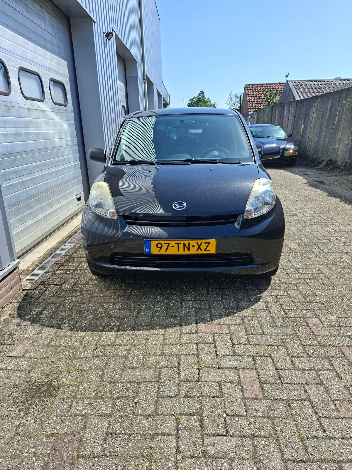 Daihatsu Sirion 1.3 2006 Zwart, Auto's, Voorwielaandrijving, Stof, 4 cilinders, Zwart