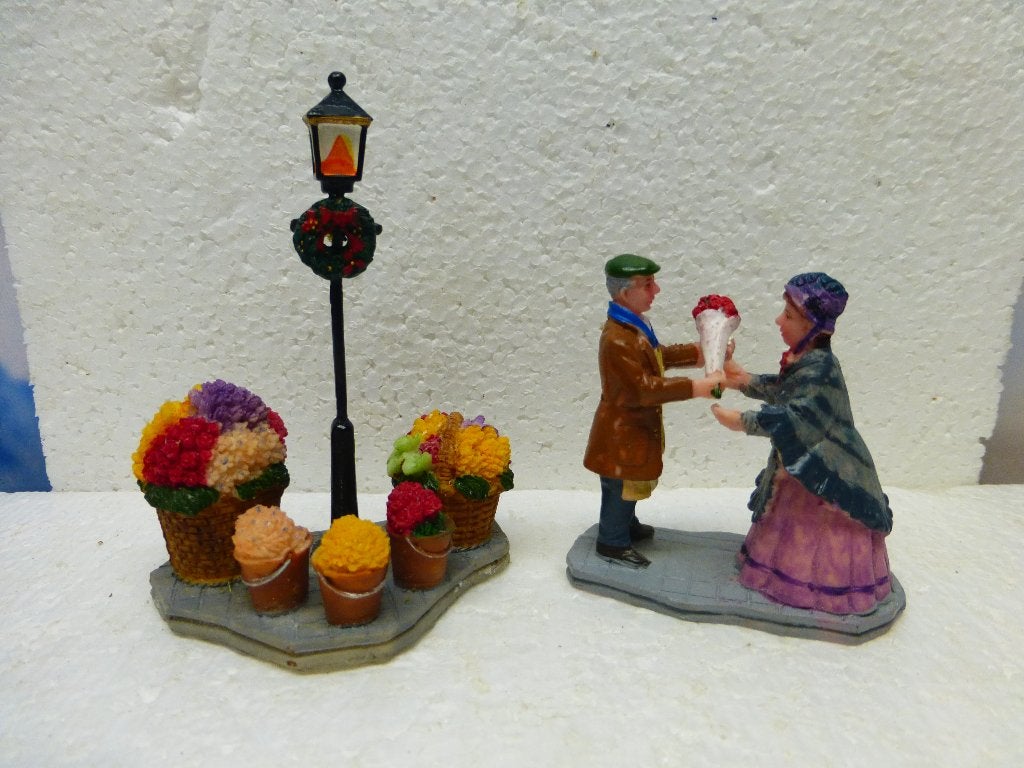 lemax flower vendor kerstdorp poppetjes bloemenkraam kerst, Diversen, Kerst, Ophalen of Verzenden, Zo goed als nieuw