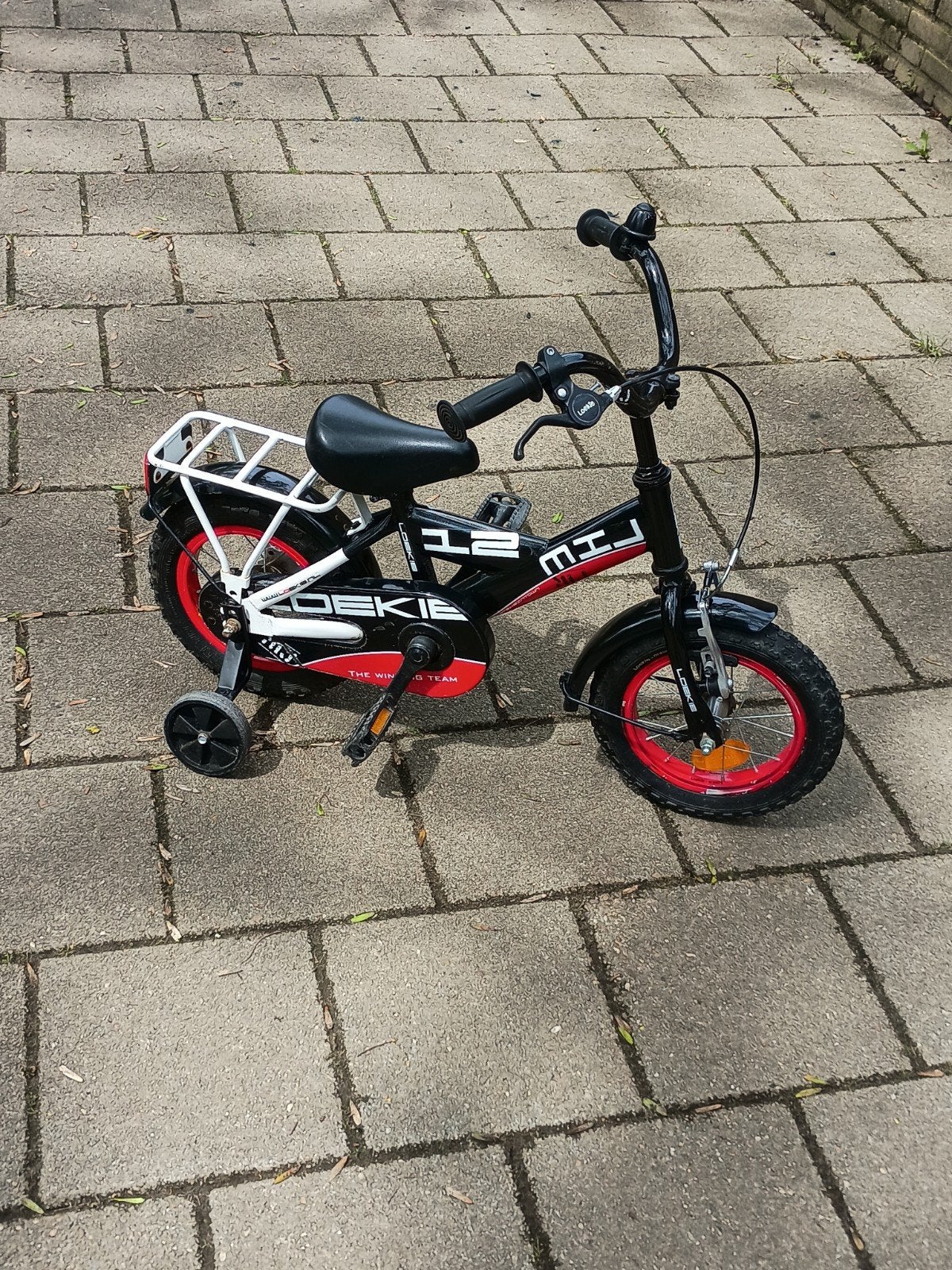 Stoere 12 inche jongens fiets met zijwieltjes van Loekie, Fietsen en Brommers, Fietsen | Kinderfietsjes, Ophalen, Zo goed als nieuw
