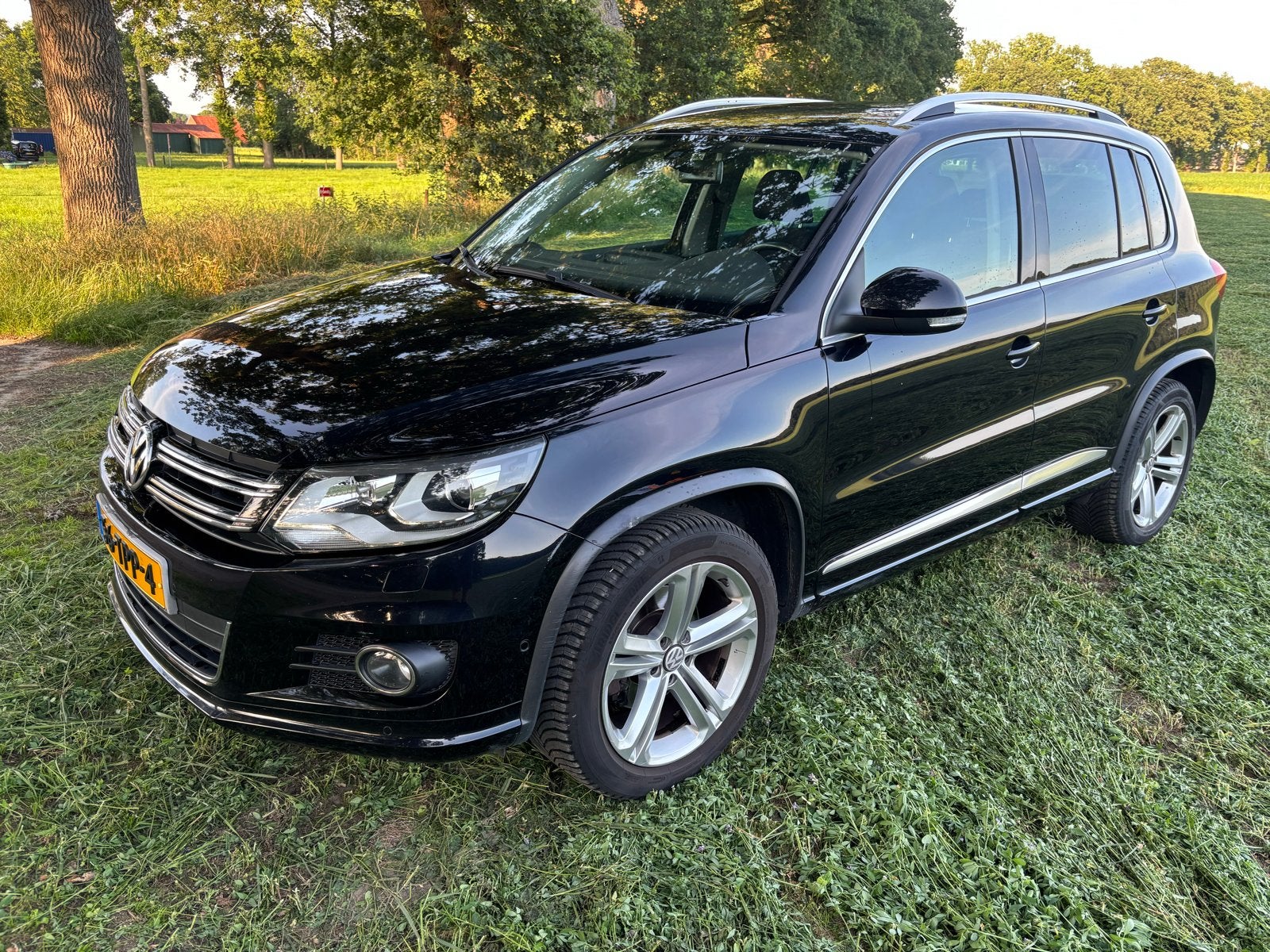 Volkswagen Tiguan 1.4 TSI R-Line 118KW BMT 2012 Zwart, Auto's, Volkswagen, Voorwielaandrijving, 1800 kg, Zwart, 4 cilinders