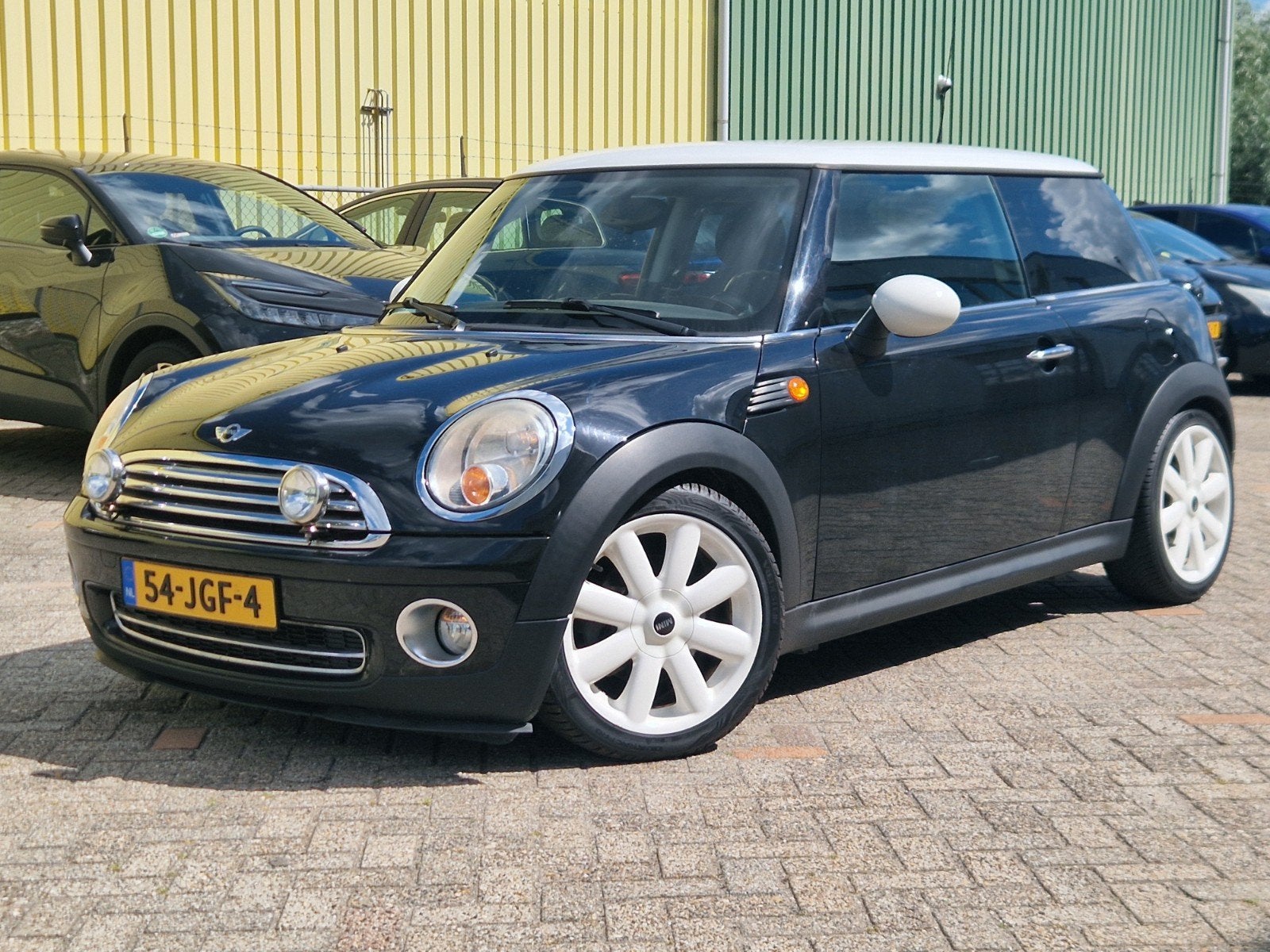 Mini 1.6 16V Cooper 2009 Zwart slechts 129000 km!, Auto's, Voorwielaandrijving, Stof, 4 cilinders, 4 stoelen