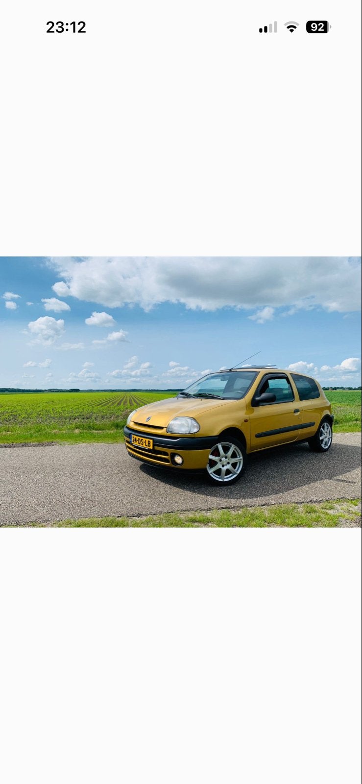 Renault Clio 1.4 RN 1999 Geel Apk tot 12-04-2027, Auto's, Voorwielaandrijving, 15 km/l, 74 pk, 31 €/maand