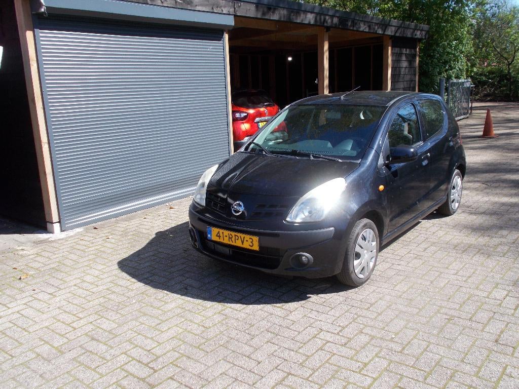 Nissan Pixo 1.0 50KW 5D 2011 Zwart (AIRCO), Voorwielaandrijving, Stof, 4 stoelen, Origineel Nederlands