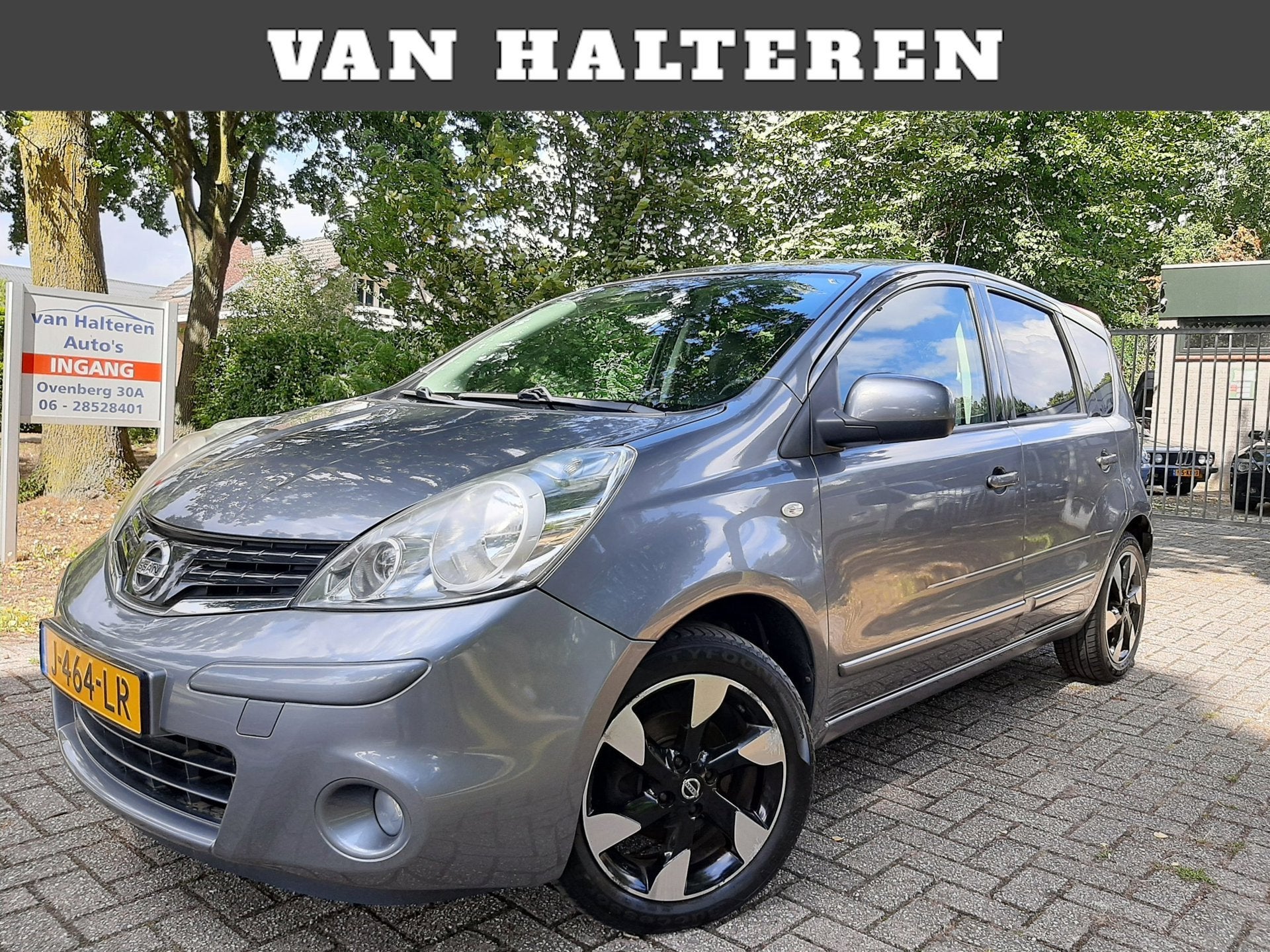 Nissan Note 1.4 Airco Navigatie Cruise Control Nieuwe APK, Auto's, Voorwielaandrijving, Euro 5, Gebruikt, Zwart