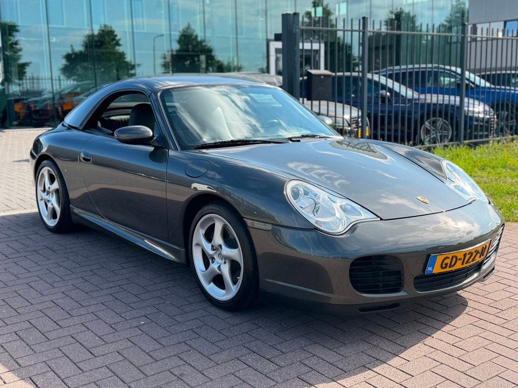 Porsche 911 Cabrio 3.6 Carrera 320PK Aero Pack Af fabriek 1e, Auto's, Porsche, Automaat, Achterwielaandrijving, Gebruikt, Zwart