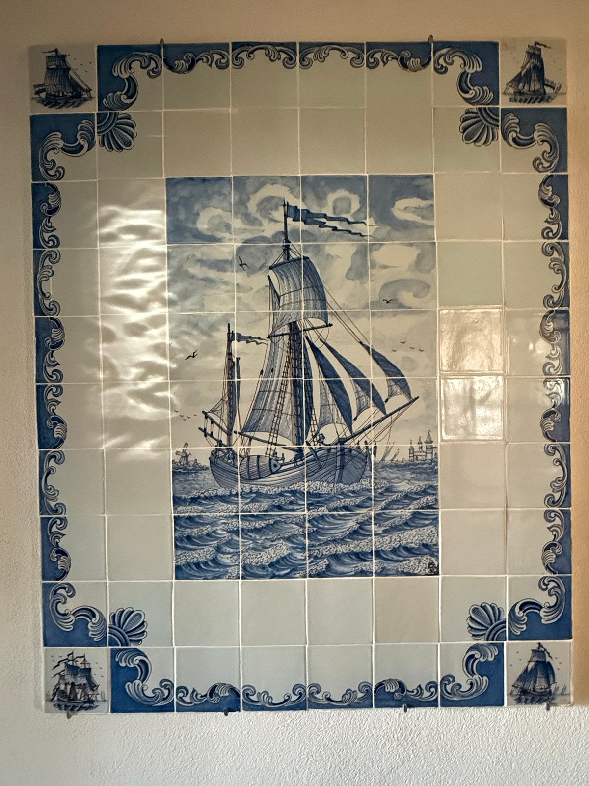 tegeltableau met zeilschip van Koch, Ophalen