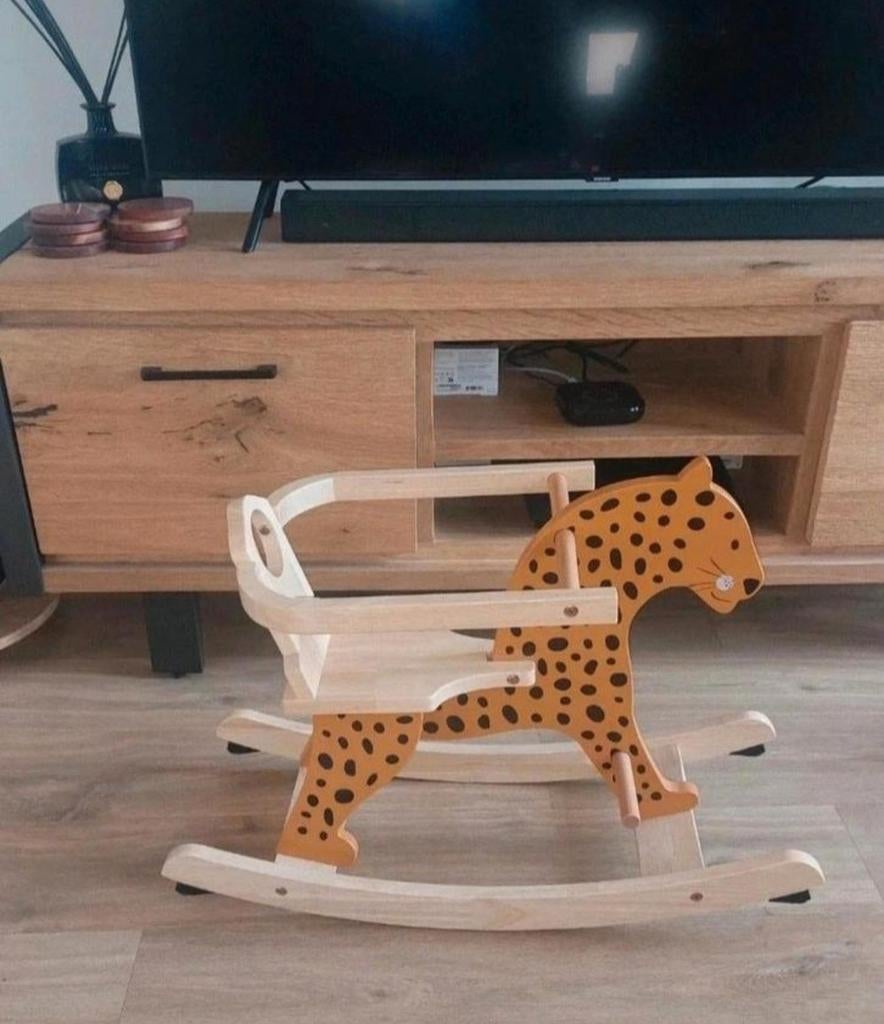 Houten wipwap luipaard, Ophalen