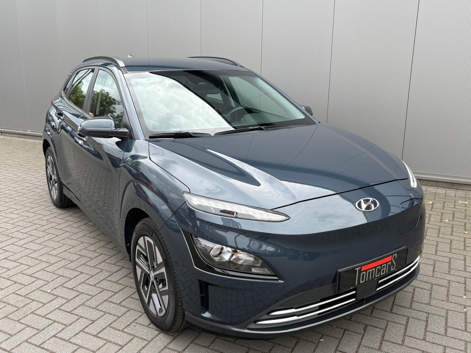 Hyundai KONA EV Fashion 64 kWh 204PK Camera/Adapt. cruise/Ca, Auto's, Dealer onderhouden, Stof, Blauw, 204 pk