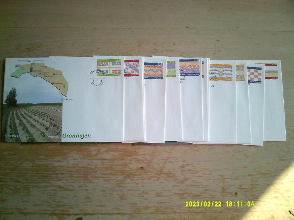 12 enveloppen Provincie 2002, met postzegels en stempel, Ophalen of Verzenden, Na 1940, Gestempeld