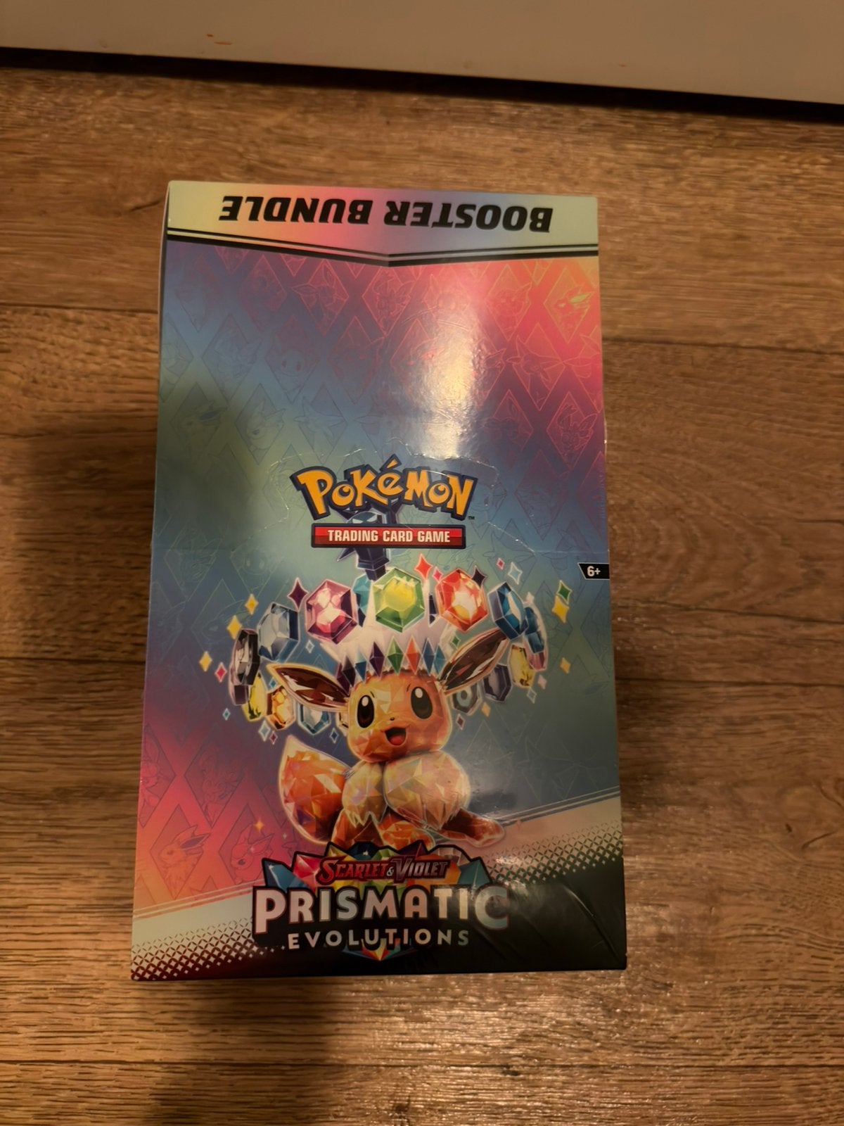 Pokemon prismatic evolutions booster bundle display