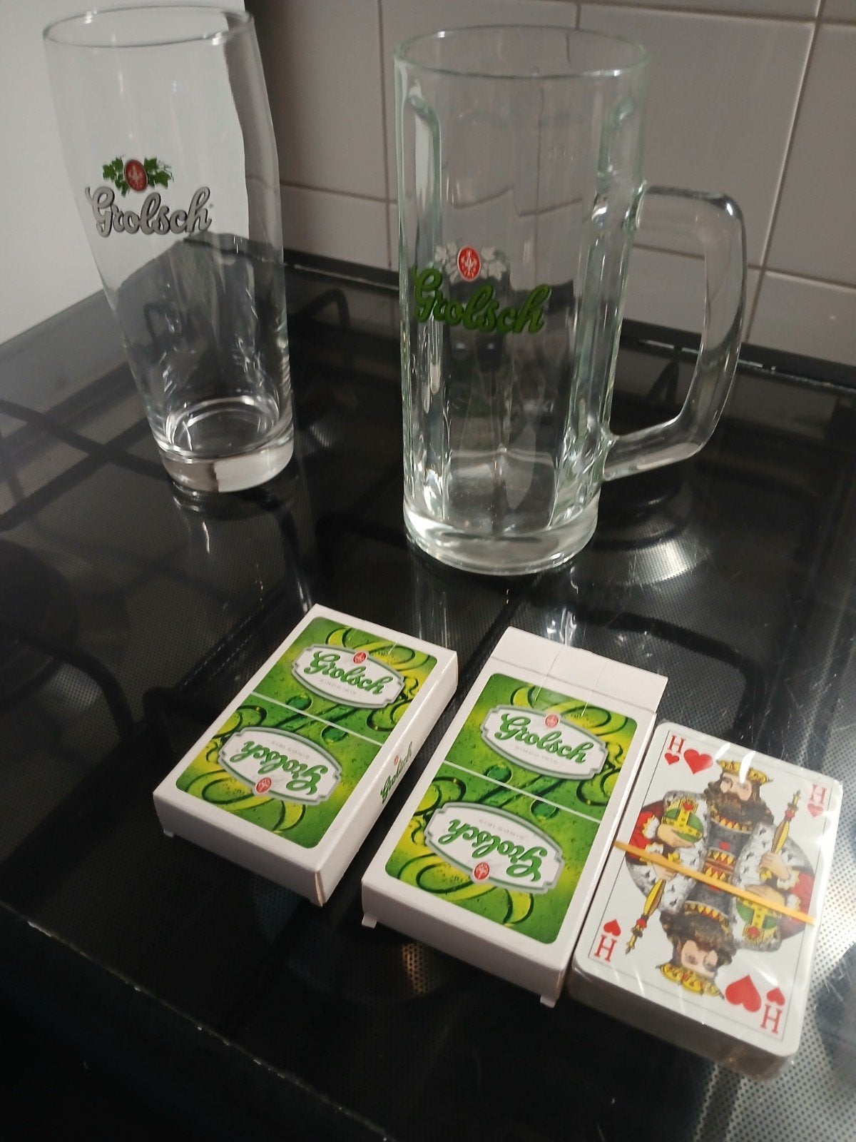 grolsch pullen, speelkaarten en 0.5 glazen, Ophalen, Zo goed als nieuw, Bierglas