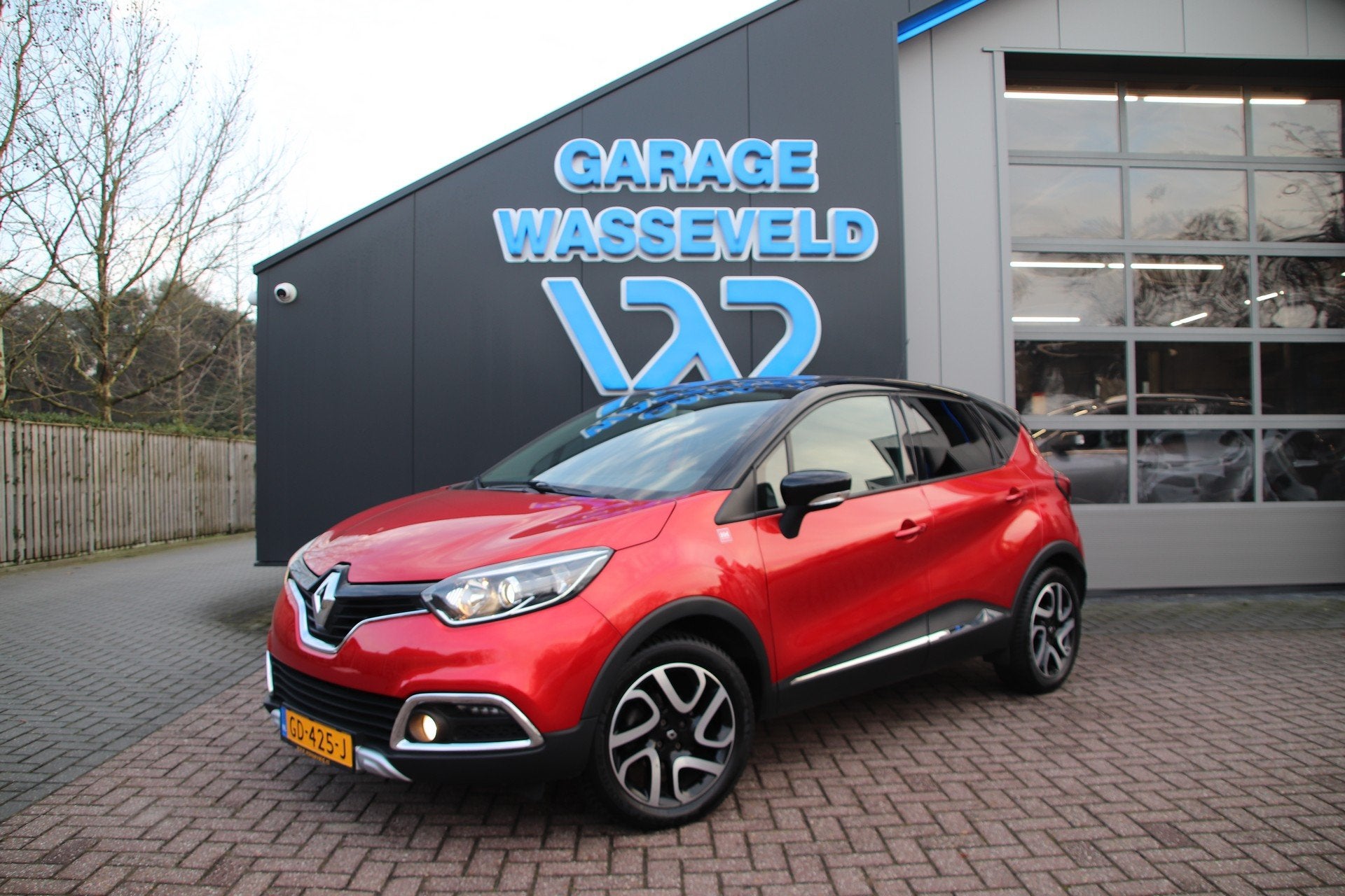 Renault Captur 0.9 TCE NL Helly Hansen Trekhaak/Camera/Navi/, Auto's, Voorwielaandrijving, Gebruikt, Zwart, Leder en Stof