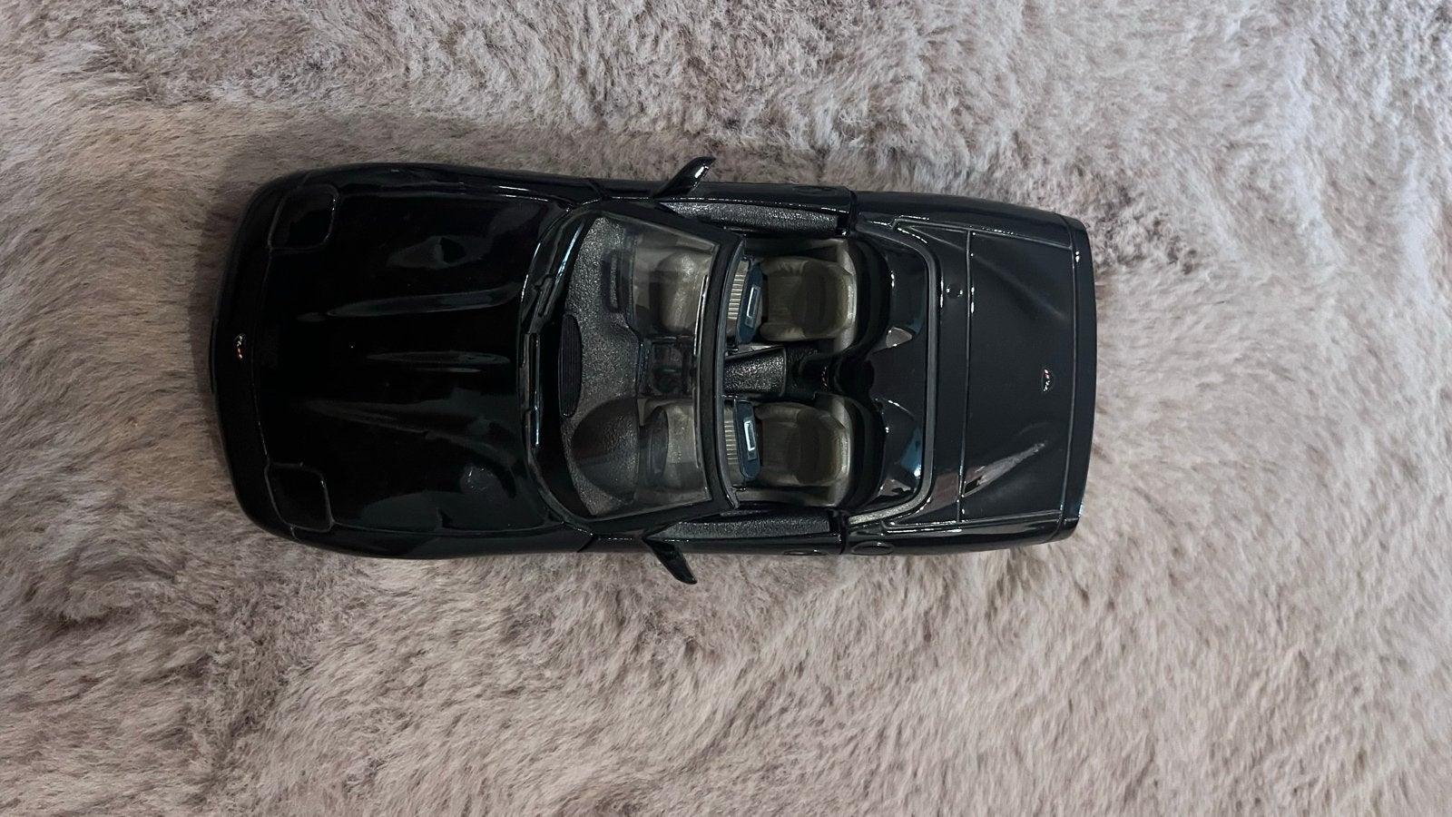 Burago Chevrolet Corvette C5 1997 - Zwart Schaalmodel, Hobby en Vrije tijd, Ophalen of Verzenden, Zo goed als nieuw, Auto