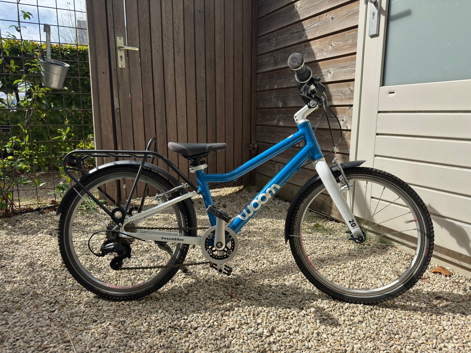 Woom 4 Blauw (20 inch), Ophalen, Zo goed als nieuw, 20 inch of meer