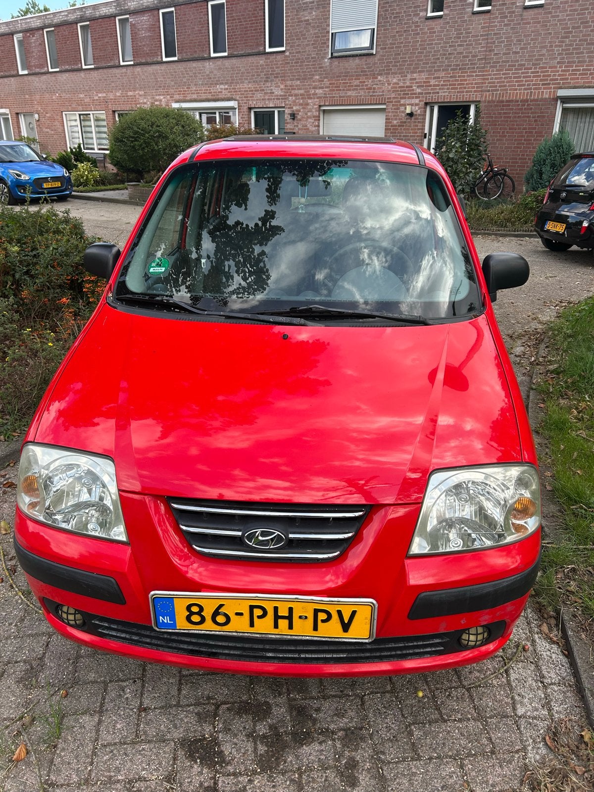 Hyundai Atos 1.1 2004 Rood, Auto's, Voorwielaandrijving, 31 €/maand, 4 cilinders, Origineel Nederlands