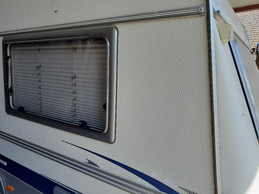 caravan raam, Ophalen