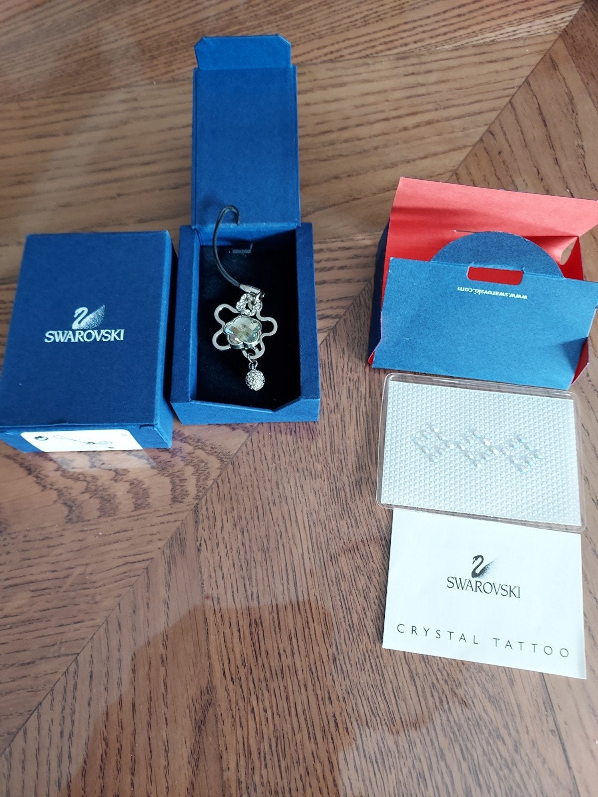 Swarovski   Phone hanger en Crystal Tattoo, Ophalen of Verzenden, Zo goed als nieuw