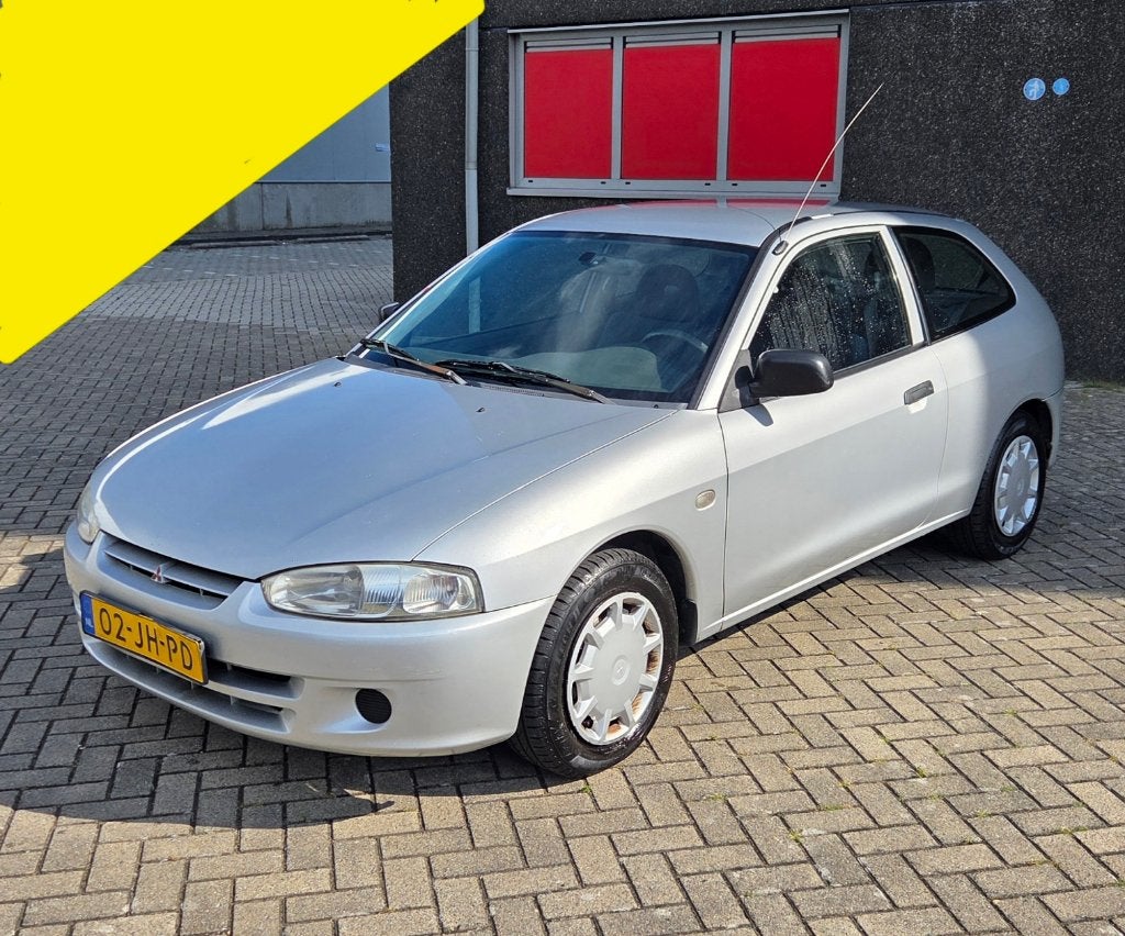 Mitsubishi Colt 1.3 GLI 2002 Grijs / AIRCO / NIEUWE APK !!, Auto's, Voorwielaandrijving, 31 €/maand, 4 cilinders, 400 kg