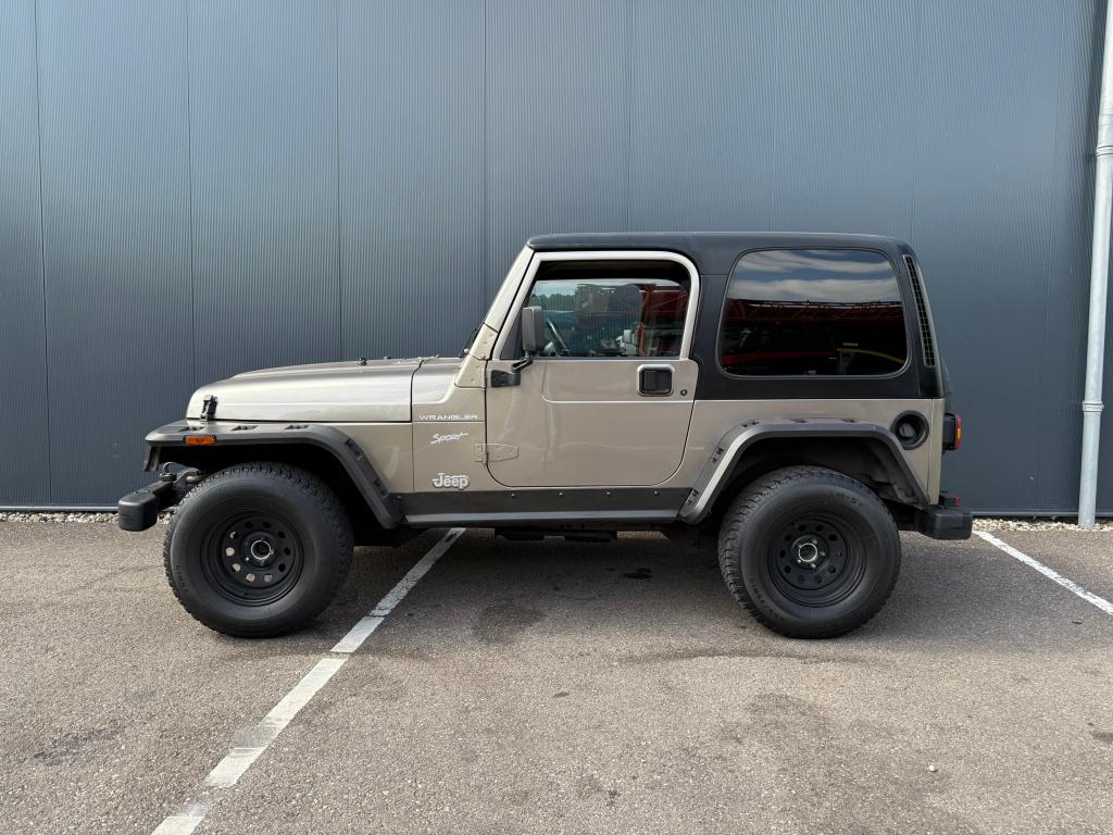 JEEP WRANGLER TJ 4.0i AUTOMAAT 4x4 2002, Automaat, Stof, Cabriolet, 4 stoelen